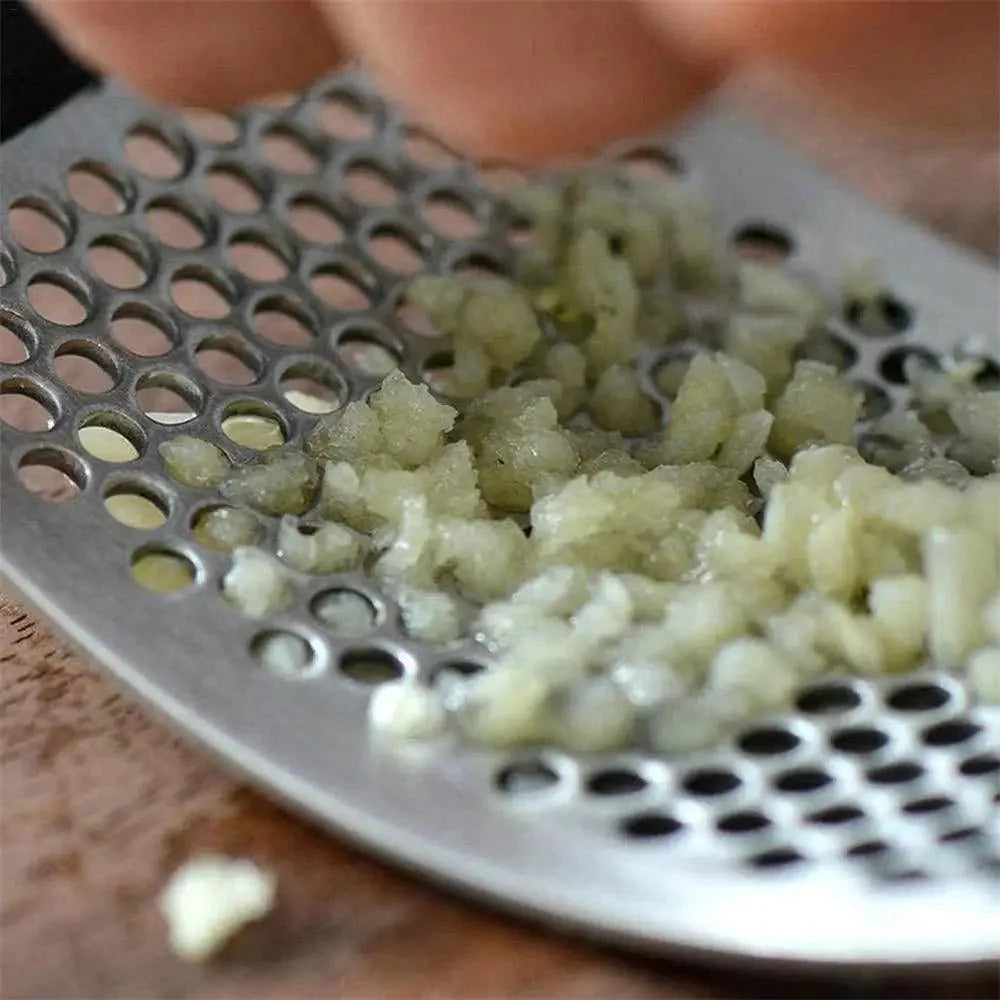New Incredible Stainless Steel Garlic Press