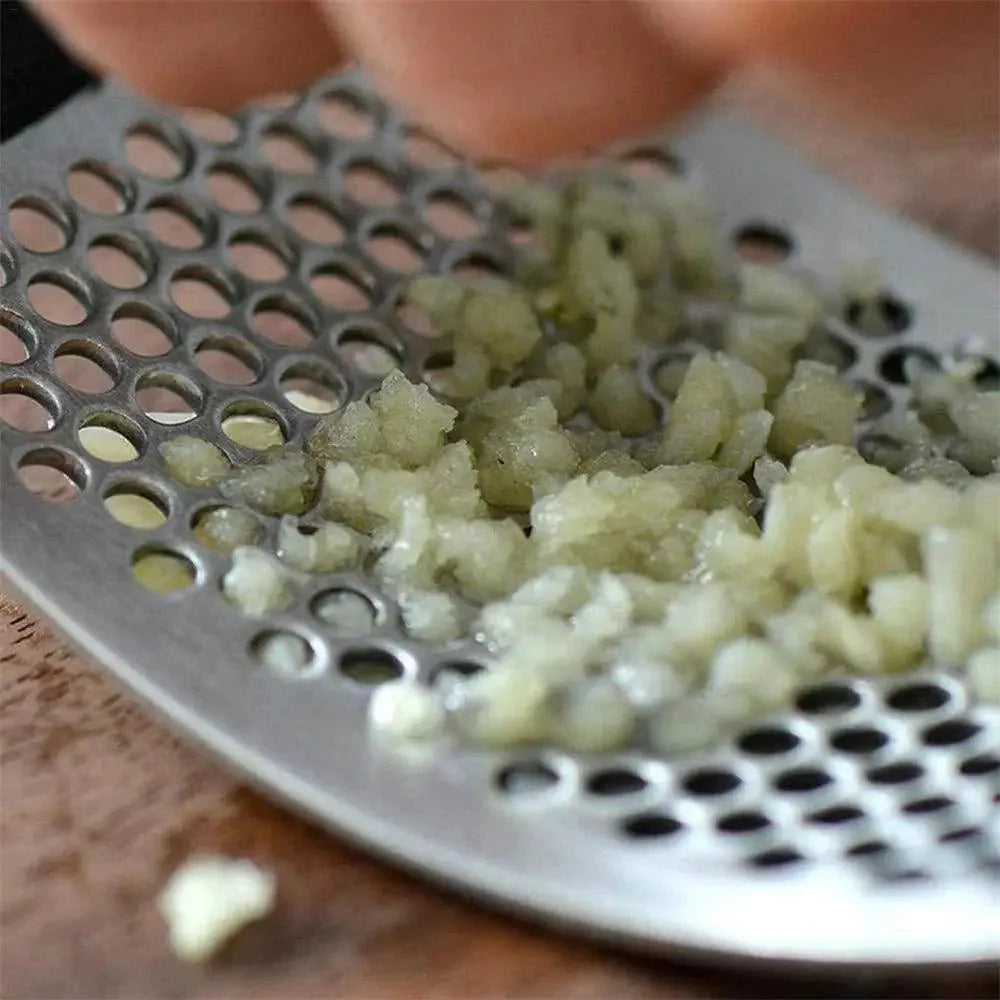 New Incredible Stainless Steel Garlic Press